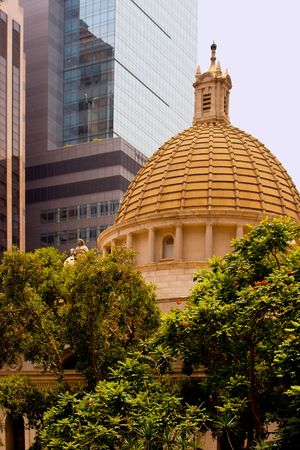 The Hong Kong old legislature building contarsting with the modern buildings behindの写真素材