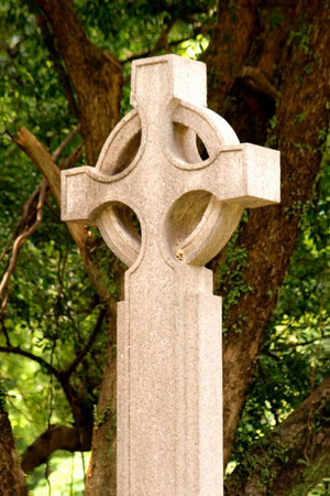 A Stone Cross in the garden of St John's Cathedral の写真素材