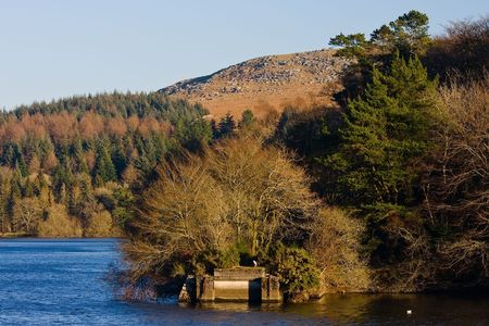 Burrator Reservoir Dartmoor, Devon, England with the rocky Tor rising behindの写真素材