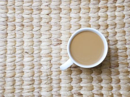 hot coffee  top view on weave mats