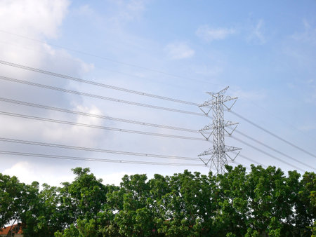 High-voltage tower on blue sky.