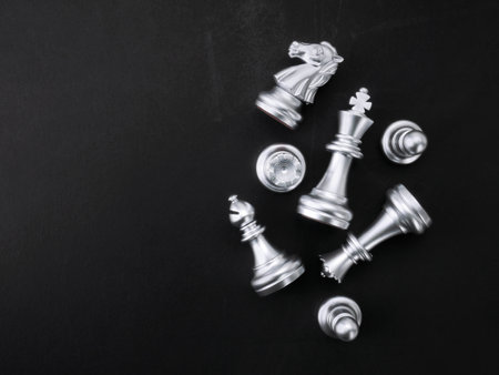 Chess silver set on black texture background.の写真素材