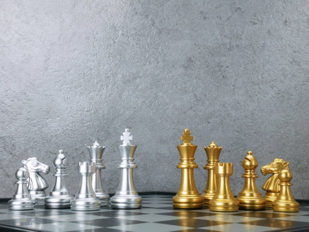 Chess golden set and Chess silver set on board game. Teamwork Concepts.の写真素材