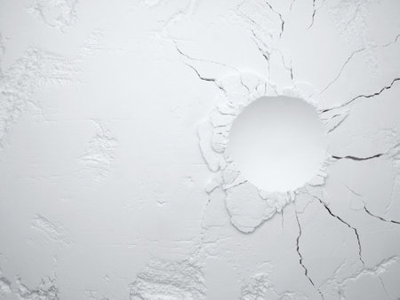 White flour texture background. Abstract powder texture. White powder surface with cracks and a round crater.の写真素材