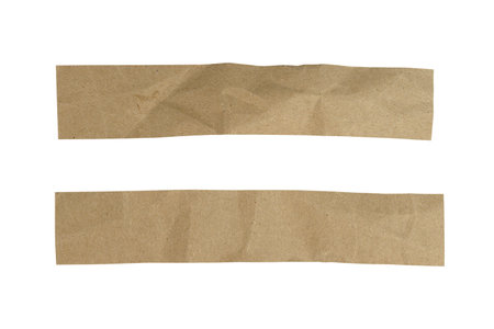 Brown crumpled paper strip isolated on white backgroundの写真素材