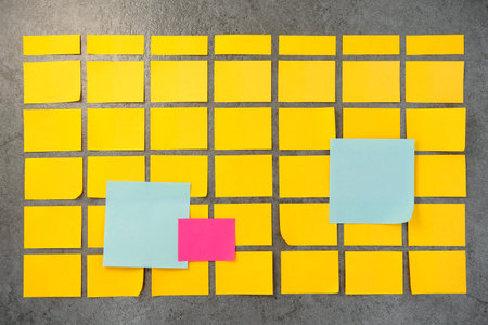 Blank  note paper on wall. Noticeboard to organize life and work concept. Note calendar