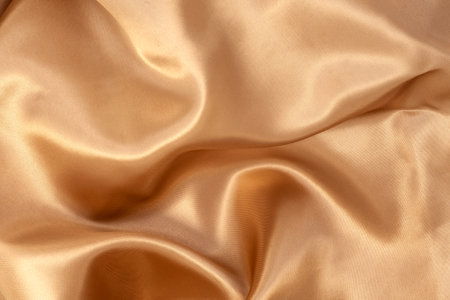 Gold fabric texture of natural for background. Luxurious canvas background.の写真素材