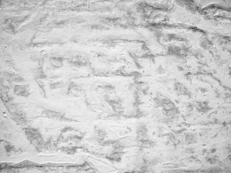 Gray rough concrete old wall background. Texture cement crack surfaceの写真素材
