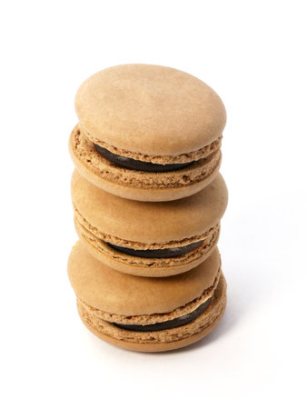 Pile of macaron cookies isolated on white backgroundの写真素材