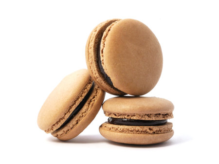 Pile of macaron cookies isolated on white backgroundの写真素材