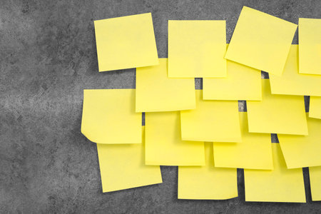 Multiple sheets sticky notes on the wall
