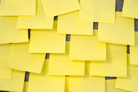 Multiple sheets sticky notes on the wall