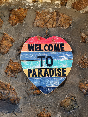 Welcome to paradise wooden heart sign