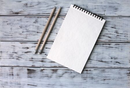 Note and pencil on the boardの写真素材