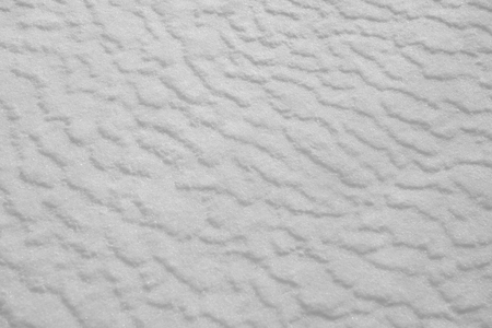 Background winter texture of white and blue clean crystal of snowの写真素材