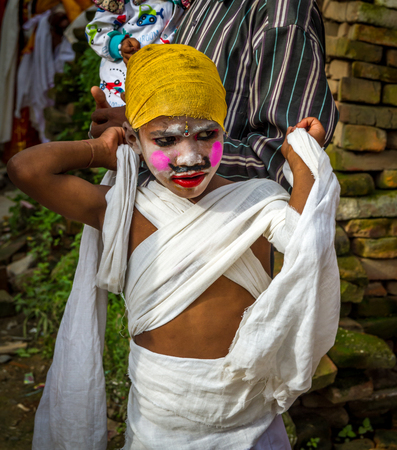 Kathmandu,Nepal - August 8,2017:Gai Jatra is a carnival of dancing, singing, mirth and laughter. The festival of cow is celebrated mainly in the Kathmandu Valley to commemorate the death of loved ones.  As part of the festival family members of the deceasのeditorial素材