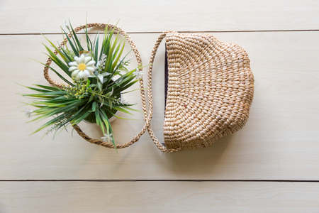 Hand made bag with flower vases with copyspace for conceptual designs.の写真素材