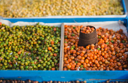 Street Food ,fried Soybean,Corn,Nuts etc with mesurement pot in the street of Nepal.の写真素材