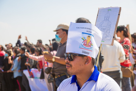 Kathmandu Nepal -Mar 3,2018: People taking part in the Guinness World Records Event 2018 organised to recite âBuddha was born in Nepalâ in Tundikhel Kathmandu Nepal. More than 75000 People were gathered and the message to the world was" Buddha was borのeditorial素材