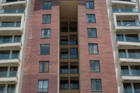High rise asian architecture,Super modern skyscraper apartment  building with balconies in...