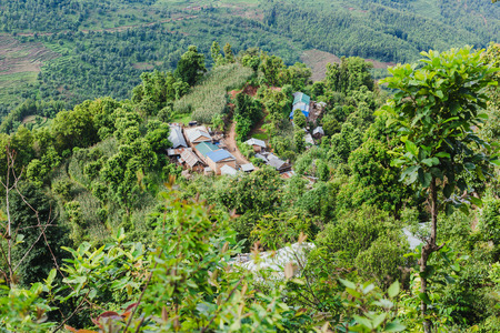 Scenery of beautiful Nepali rural village with mountains  and green forest.It is in the hilly region of Gorkha Nepal.Breathtaking view,Dramatic and picturesque scene. Popular tourist attraction destinations.の写真素材