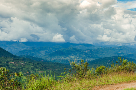Scenery of beautiful Nepali rural village with mountains  and green forest.It is in the hilly region of Gorkha Nepal.Breathtaking view,Dramatic and picturesque scene. Popular tourist attraction destinations.の写真素材