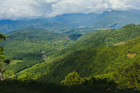 Scenery of beautiful Nepali rural village with mountains  and green forest.It is in the hilly region of Gorkha Nepal.Breathtaking view,Dramatic and picturesque scene. Popular tourist attraction destinations.の写真素材