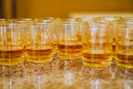 Brewery, drinks and alcohol concept ,different types of beverages/drinks in glasses on trolley ready to serve in party.の写真素材