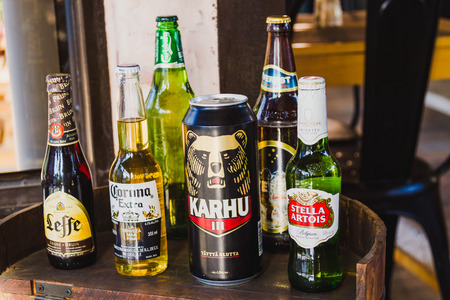 Kathmandu,Nepal - Dec 16,2017: Different brands of booze, liquor, or alcohol in a bar or tavern. Multiple bottles of adult beverages  at bar, Line of liquor bottlesのeditorial素材