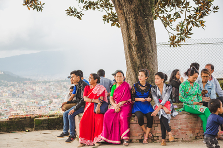 Kathmandu,Nepal - Aug 17,2018: Nepali people enjoying together with friends and families in Kritipur against beautiful background view of Kathmandu Valley.Asian People.のeditorial素材