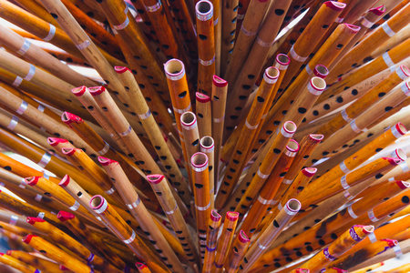 Colorful locally made bamboo flutes kept for sale,Bamboo Flutes background,textureの写真素材