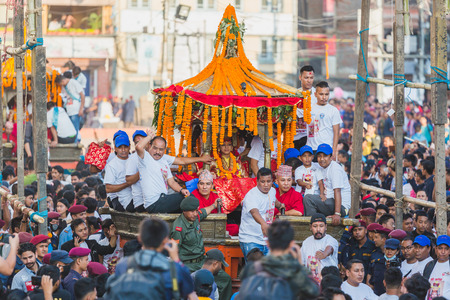 Kathmandu,Nepal - Sep 24,2018:Living God - Kumari in Cart at Indra Jatra Festival in Kathmandu. Indra Jatra is an important annual festival in Nepal, particularly in the capital city of Kathmandu. âIndraâ is the name of the Hindu god of rain of heavenのeditorial素材