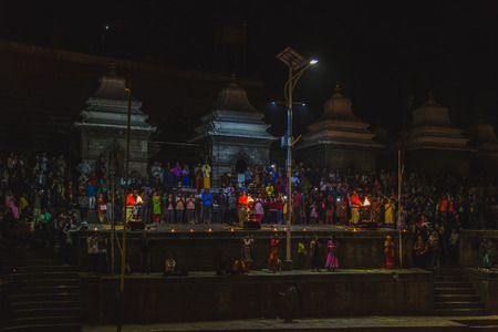 Kathmandu,Nepal - Oct 8,2018:Evening Aarati,Holy Man Brahmins offering prayers to god at Pashupatinath Kathmandu.のeditorial素材