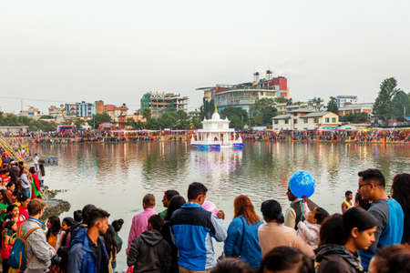 Kathmandu,Nepal - November 1,2019: Hindu devotees Celebrating Chhath Puja Festival at Kamal pokhari, Kathmandu. Chath Puja Celebrationのeditorial素材