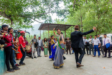 Kathmandu,Nepal - June 25,2019: Nepali People enjoying with local music and dance during wedding ceremony in rural village of Nepal.のeditorial素材