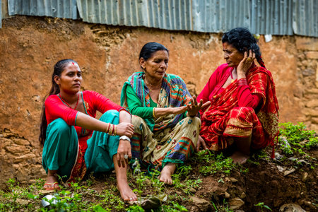 Gorkha,Nepal - June 26,2019: Nepali Women with traditional attire in rural village of Nepal.のeditorial素材