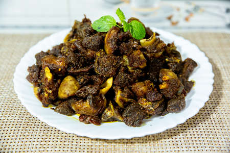 Delicious Indian Nepali Style Mutton Fry, dry fry meat,Dashain Special Mutton Fry Recipe.Selective focus photograph.の写真素材