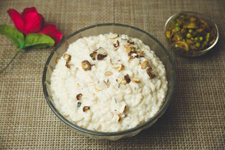 Kheer or rice pudding is an Nepali Indian dessert. Rice Kheer is a pudding from Indian subcontinent, made by boiling milk ,sugar, Rice and some nuts. Selective foucusの写真素材