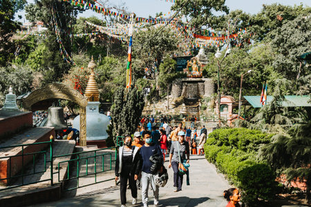 Kathmandu - 19 Nov 2022: Tourists visitors in Swayambhunath Stupa or The Monkey Temple Premises in Kathmandu Nepal.のeditorial素材