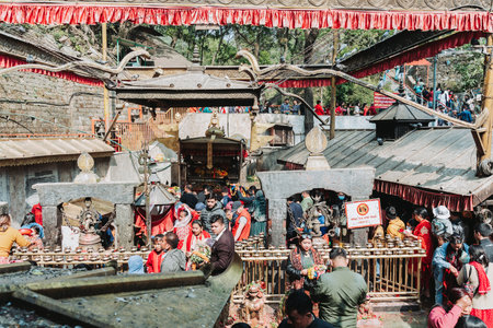 kATHMANDU, NEPAL - April 14, 2023: Hindu devotees offering prayers at Dakshinkali Temple near kathmandu on the occasion of Nepalese New Year 2080.のeditorial素材