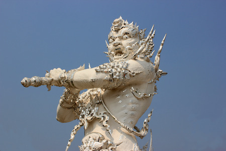 Sculpture at Wat Rong Khun or White Temple, a contemporary unconventional Buddhist temple in Chiangrai, Thailand, was designed by Arjan Chalermchai Kositpipatの写真素材