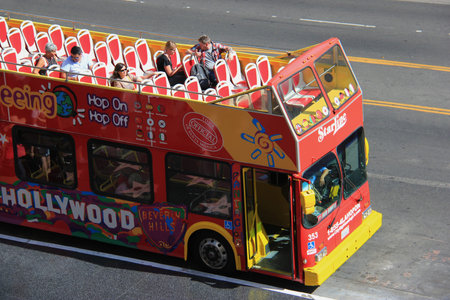 Los Angeles, California, USA - May 19, 2014: A tour bus is taking tourists to travel at Hollywood Boulevard, California.のeditorial素材