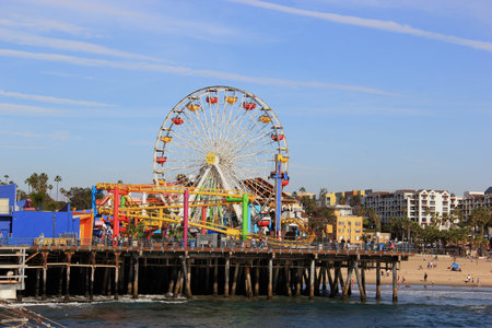 Santa Monica, California, USA - November 16, 2014: The Santa Monica Pier, 100 year old landmark, contains shops, restaurants and a family amusement park called Pacific Park, which is the only amusement park located on a pier on the west coast of the Uniteのeditorial素材
