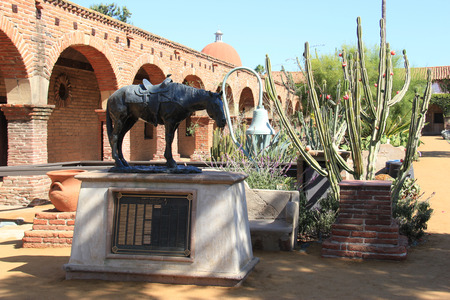 San Juan Capistrano, California - November 2, 2014: Statue of \\\"Empty Saddles\\\" at Mission San Juan Capistrano, a Spanish Mission in Colonial Las Californias, is a faithful memorial and in fond memory of the riders of El Viaje de Portola.のeditorial素材