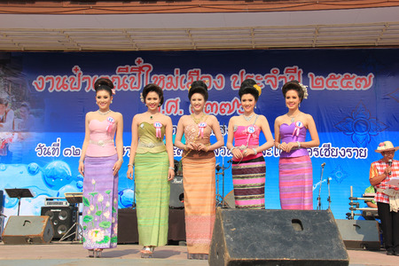 Chiangrai, Thailand - April 13, 2014: The contestants for Miss Songkran 2014 are standing on the stage for judges to consider.のeditorial素材