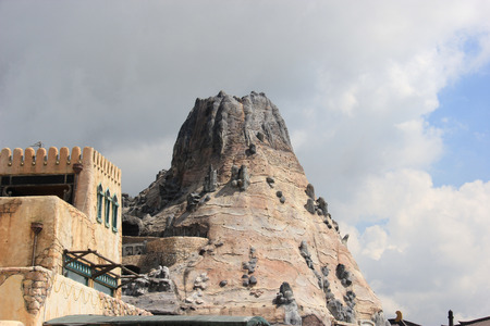 Vulcania is a 40 meter tall replica volcano with the River of Fire white-water and Dragon Quest roller coaster rides at Macau Fishermanのeditorial素材