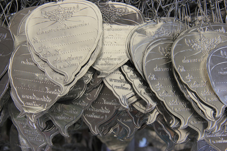 Metal Plate in Bodhi Leaves Shape for Buddhists to write down their names, birthday for exorcisingの写真素材