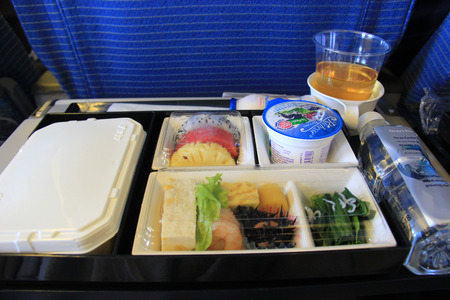 Bangkok, Thailand - May 12, 2015: Airline meal, prepared by airline catering services, is a meal served to passengers on board a commercial airliner.のeditorial素材