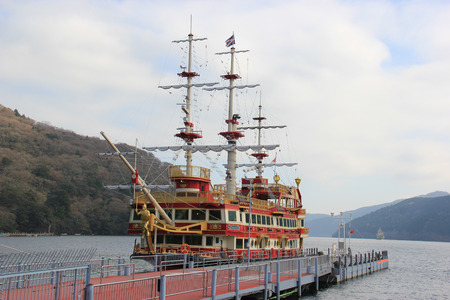 Hakone, Japan - April 9, 2015: The Hakone Sightseeing Cruise serves the 3 ports on Lake Ashi, a crater lake that lies along the southwest wall of the caldera of Mount Hakone, a complex volcano.のeditorial素材