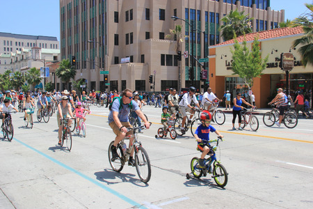 Pasadena, California, USA - May 31, 2015: CicLAvia is an event held in Los Angeles where streets are closed to motor vehicles and open for the public to walk, bike and skate through open streets. Pasadena, California, USA - May 31, 2015: CicLAvia is an event held in Los Angeles where streets are closed to motor vehicles and open for the public to walk, bike and skate through open streets.